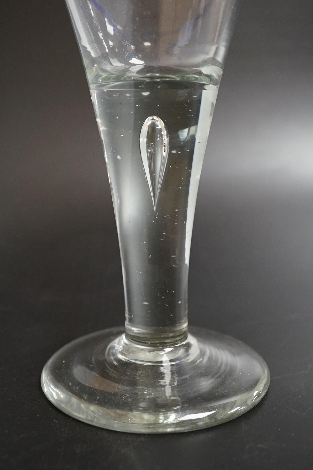 An 18th century blue rimmed wine glass, 16cm